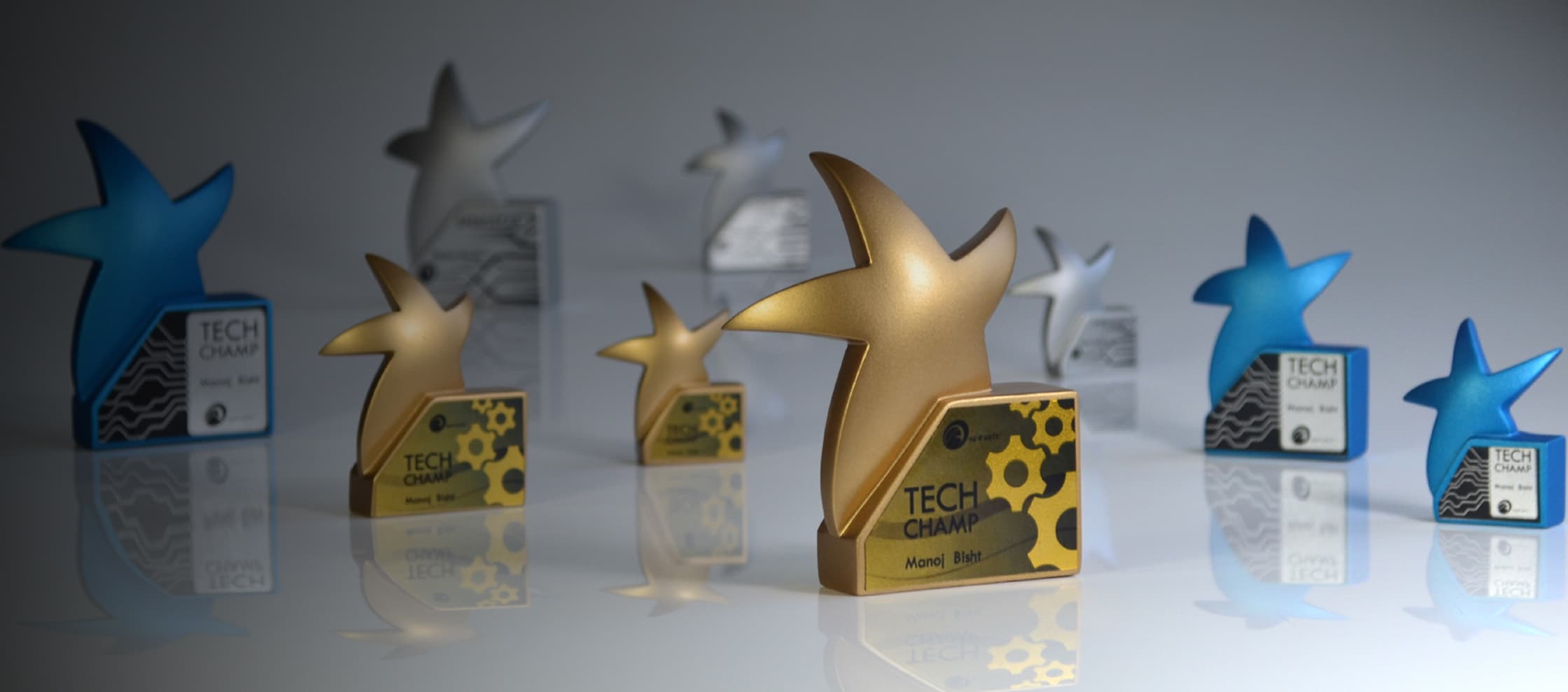 9 miniature star awards in 3 different colors