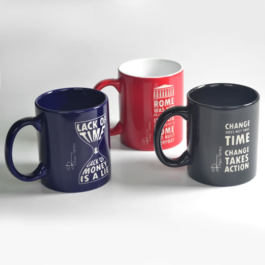 3 different colors and different designs of engraved coffee mugs