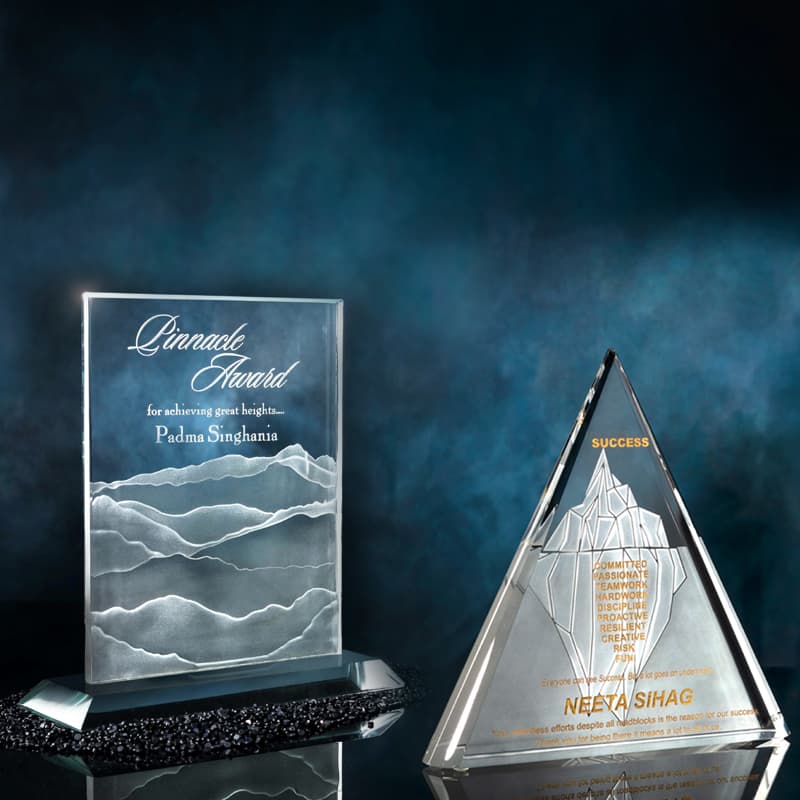 Pinnacle Award in Glass and Iceberg Award in Crystal and how engraving looks on these 2 different material
