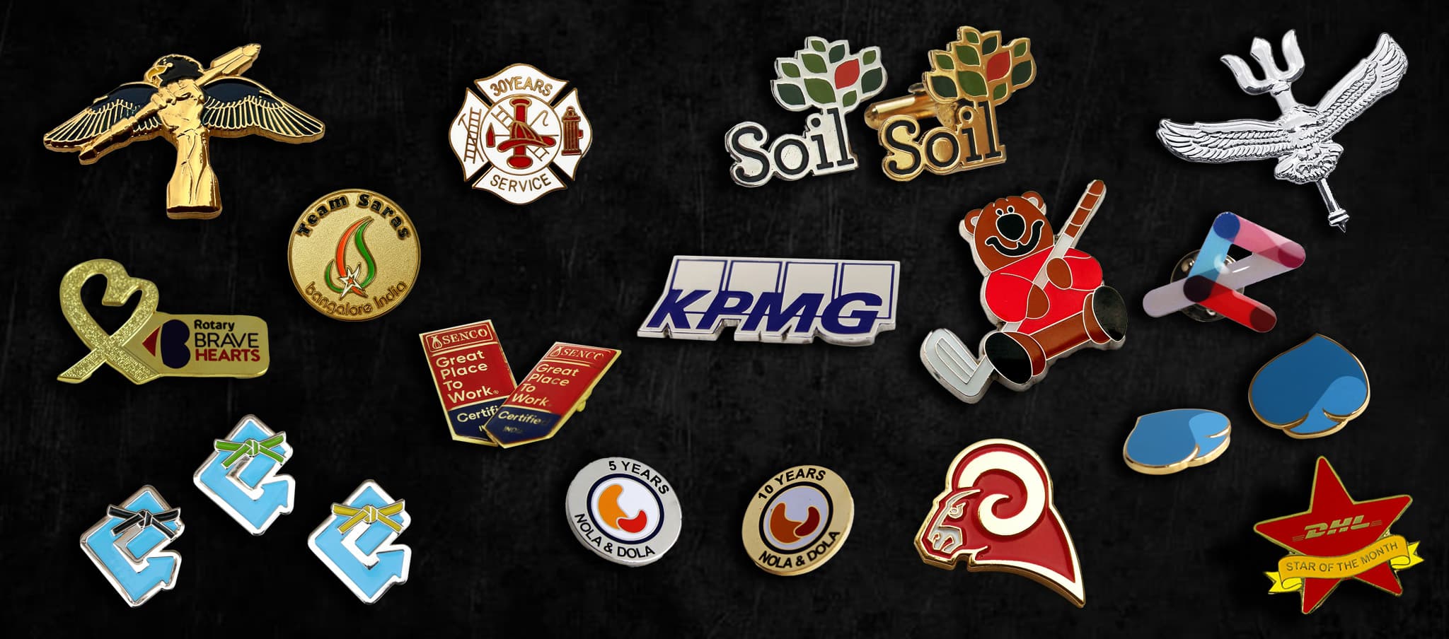 A black background adorned with a variety of badges and lapel pins, exhibiting an array of styles and types